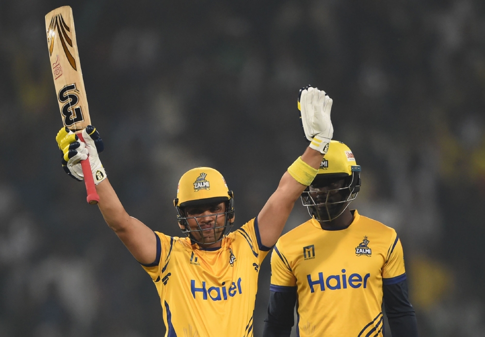 Cricketer Kamran Akmal of Peshawar Zalmi plays a shot during the Twenty20 (T20) cricket match of the Pakistan Super League (PSL) between Peshawar Zalmi and Karachi King at The Gaddafi Cricket Stadium in Lahore on March 21, 2018. AFP / Arif Ali