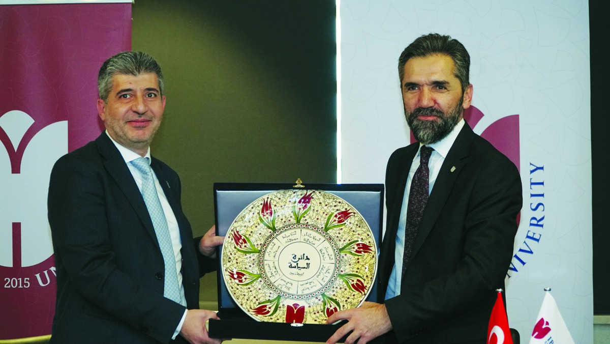 President of HBKU, Dr. Ahmad M Hasnah, with the President of IHU, Dr. Recep ?entürk, during the signing ceremony. 
