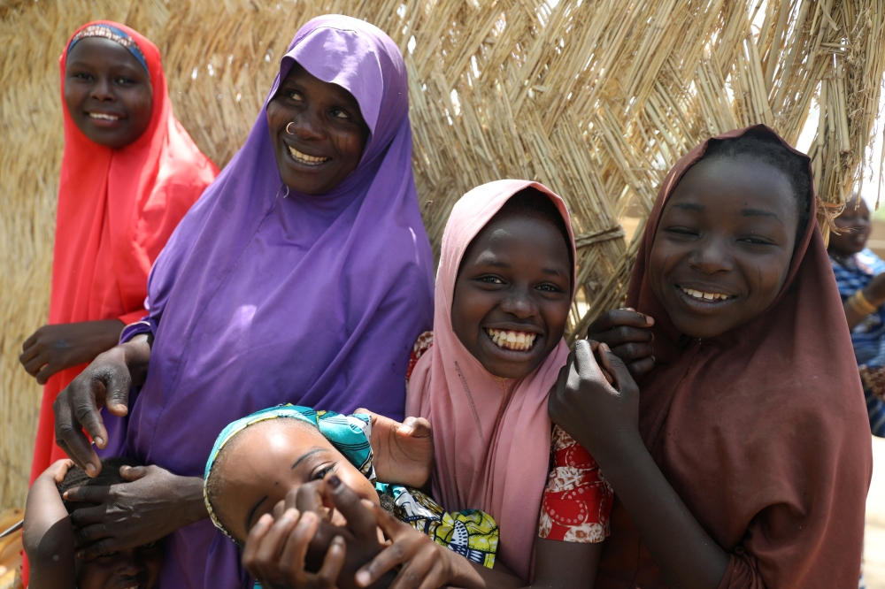 Relatives of one of the newly released Dapchi schoolgirls pose for a picture in Dapchi, in the northeastern state of Yobe, Nigeria March 22, 2018. REUTERS/Afolabi Sotunde