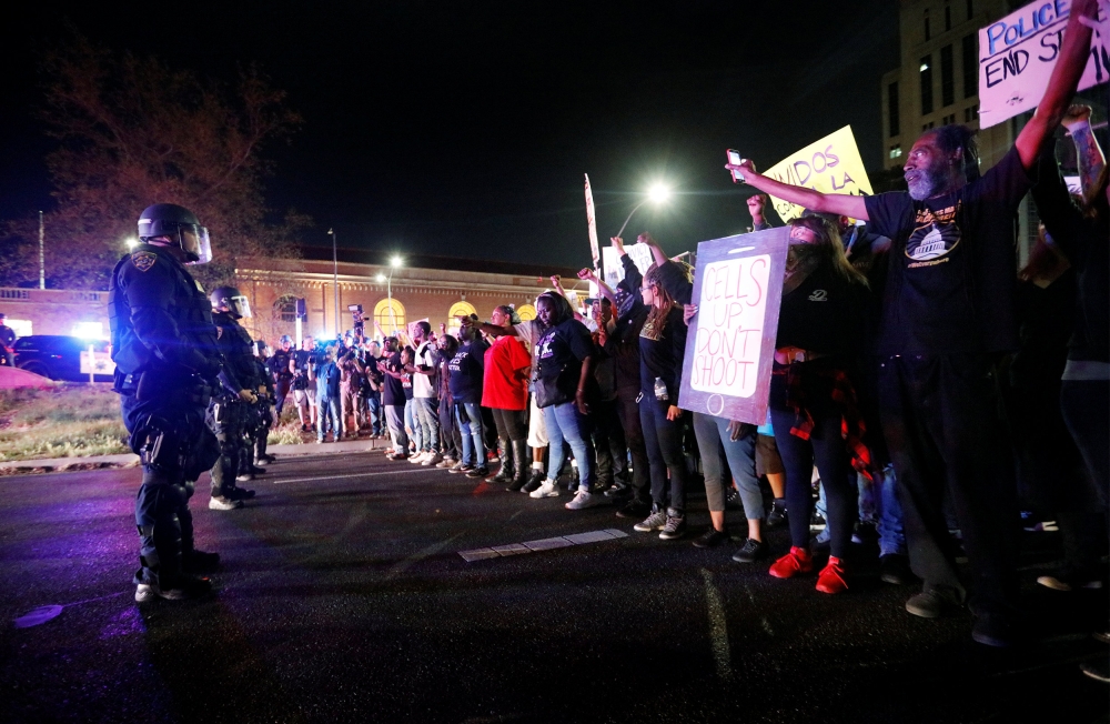 Demonstrators protest the police shooting of Stephon Clark, in Sacramento, California, U.S., March 30, 2018. REUTERS/Bob Strong