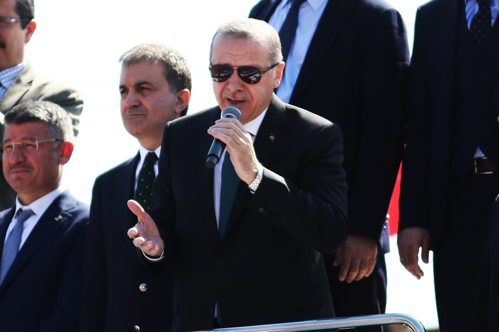 President of Turkey and leader of Turkey's ruling Justice and Development Party (AK Party) Recep Tayyip Erdogan addresses the crowd ahead of the AK Party's 6th ordinary provincial congress in Adana province of Turkey on April 1, 2018. Eren Bozkurt - Anado