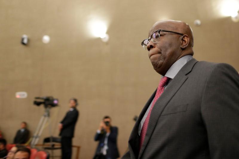 Joaquim Barbosa, former minister of the supreme court of Brazil, is seen on arrival during a session where Brazil's electoral court will take up 2014 case that could unseat President Michel Temer, in Brasilia, Brazil June 8, 2017. Reuters/Ueslei Marcelino
