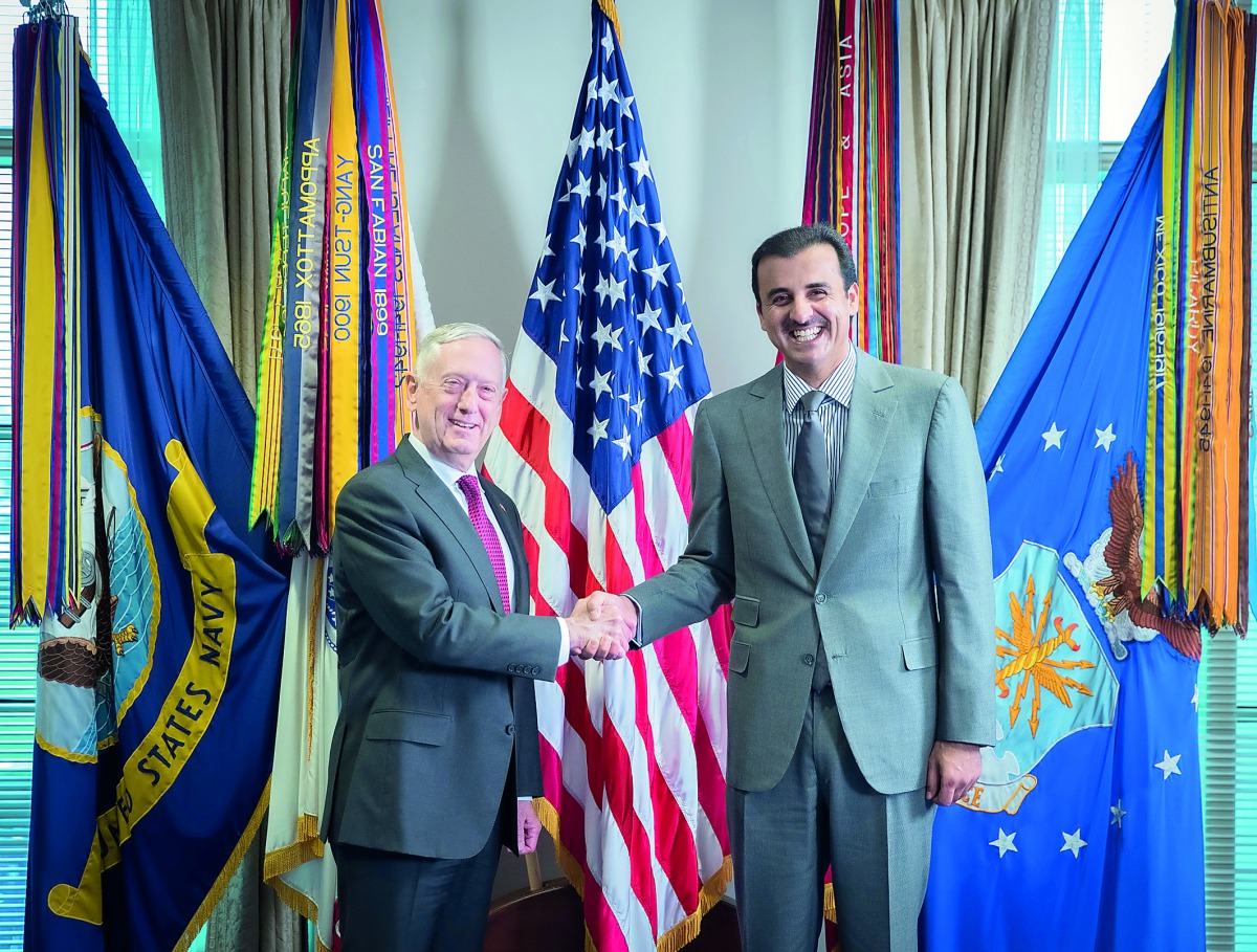 Emir H H Sheikh Tamim bin Hamad Al Thani with the US Defense Secretary James Mattis at the Pentagon in Washington DC, yesterday.