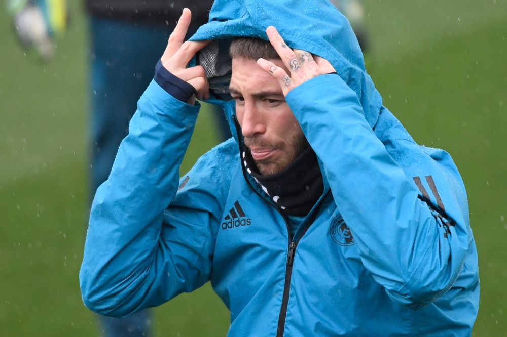 Real Madrid's Spanish defender Sergio Ramos attends a training session at Valdebebas Sport City in Madrid on April 10, 2018 on the eve of the UEFA Champions League quarter-final second leg football match against Juventus. / AFP / GABRIEL BOUYS