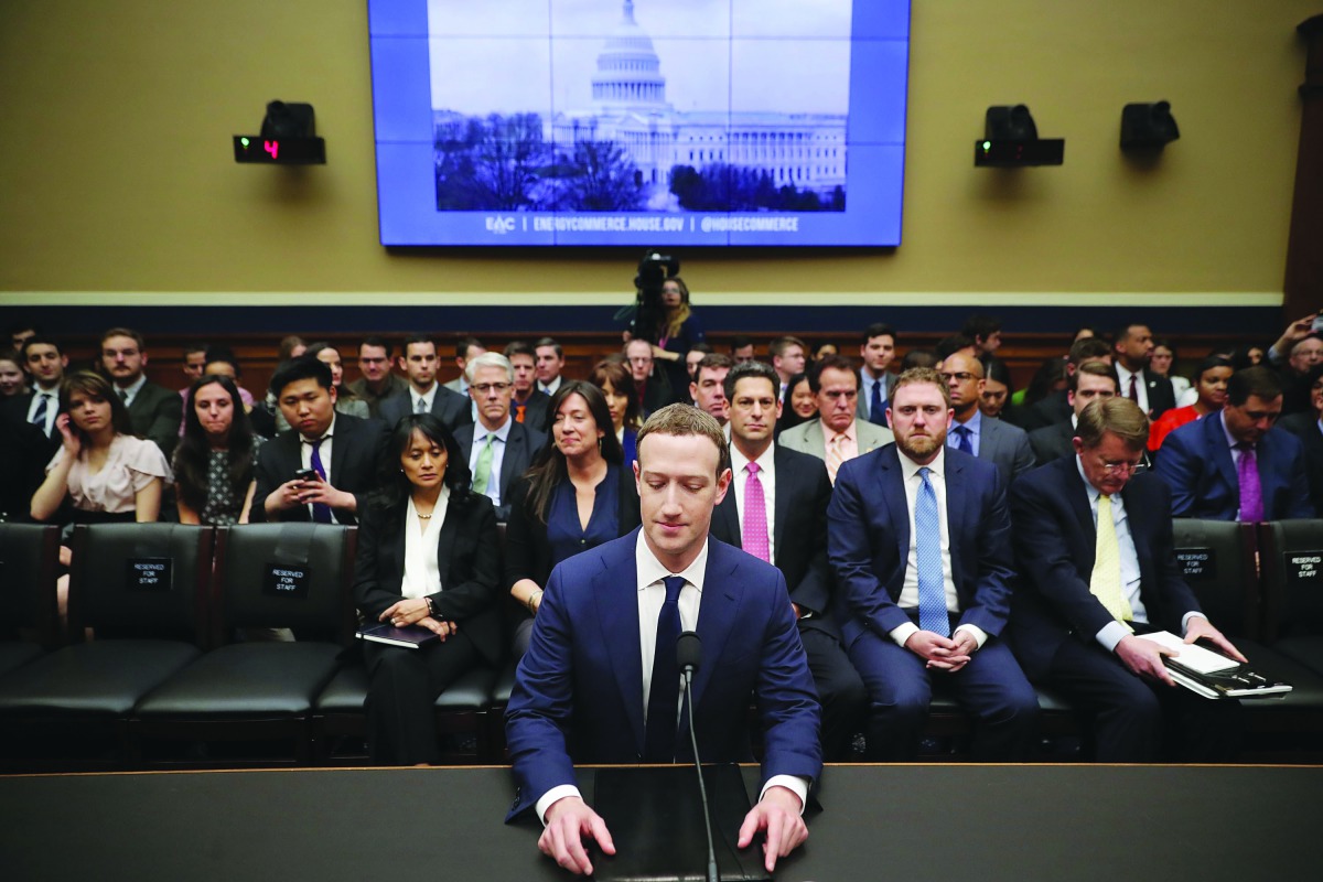  Mark Zuckerberg prepares to testify before the House Energy and Commerce Committee in the Rayburn House Office Building on Capitol Hill April 11, 2018 in Washington, DC. Chip Somodevilla/Getty Images/AFP