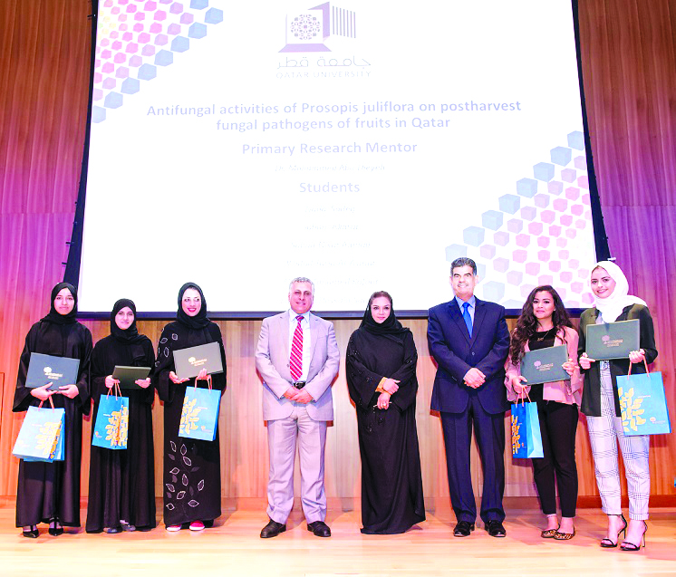 The winners of QNRF’s 10th Annual UREP Competition with Dr Abdul Sattar Al Taie (third right), Executive Director, QNRF, and Dr Aisha Al Obaidly (fourth right), Director of Capacity Building, QNRF.