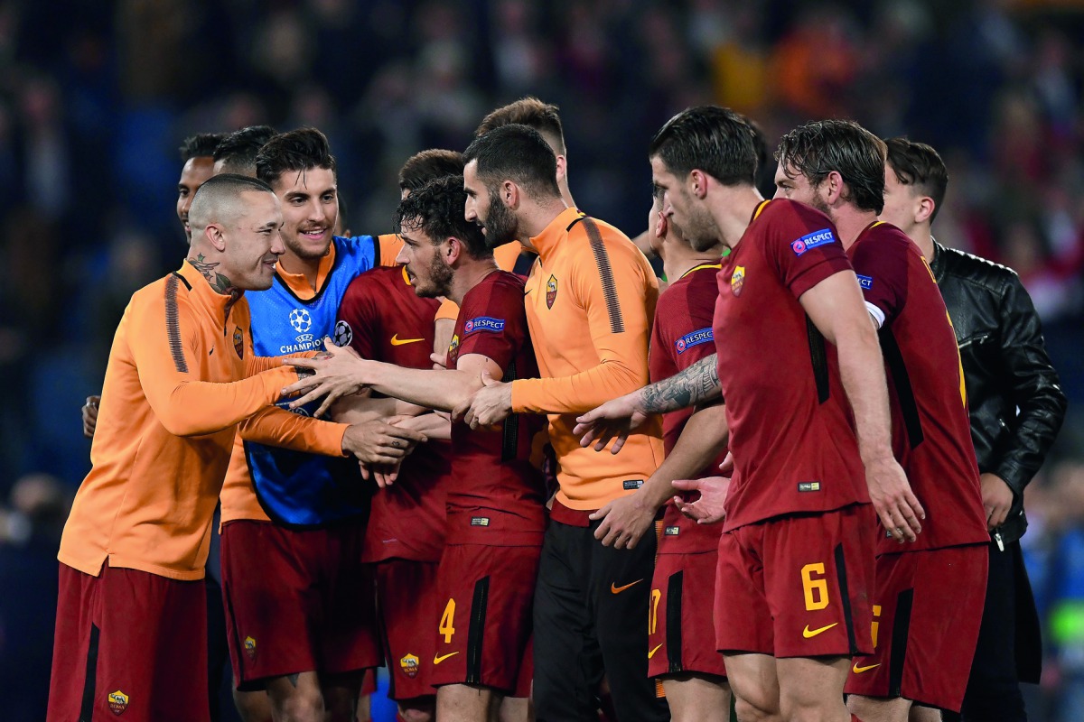  Players of AS Roma celebrate after the UEFA Champions League quarters soccer match between AS Roma and FC Barcelona at the Stadio Olimpico in Rome, Italy on April 10, 2018.Claudio Pasquazi/ Anadolu Agency