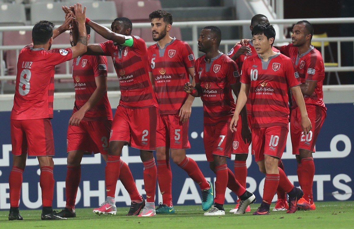 Al Duhail players celebrate after scoring a goal during a QNB Stars League match in this file photo.