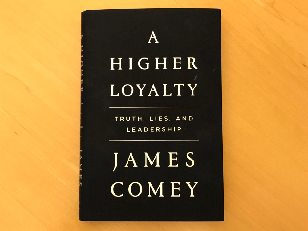 A copy of 'A Higher Loyalty' by former FBI director James Comey is seen in New York City, April 13, 2018. Reuters / Soren Larson