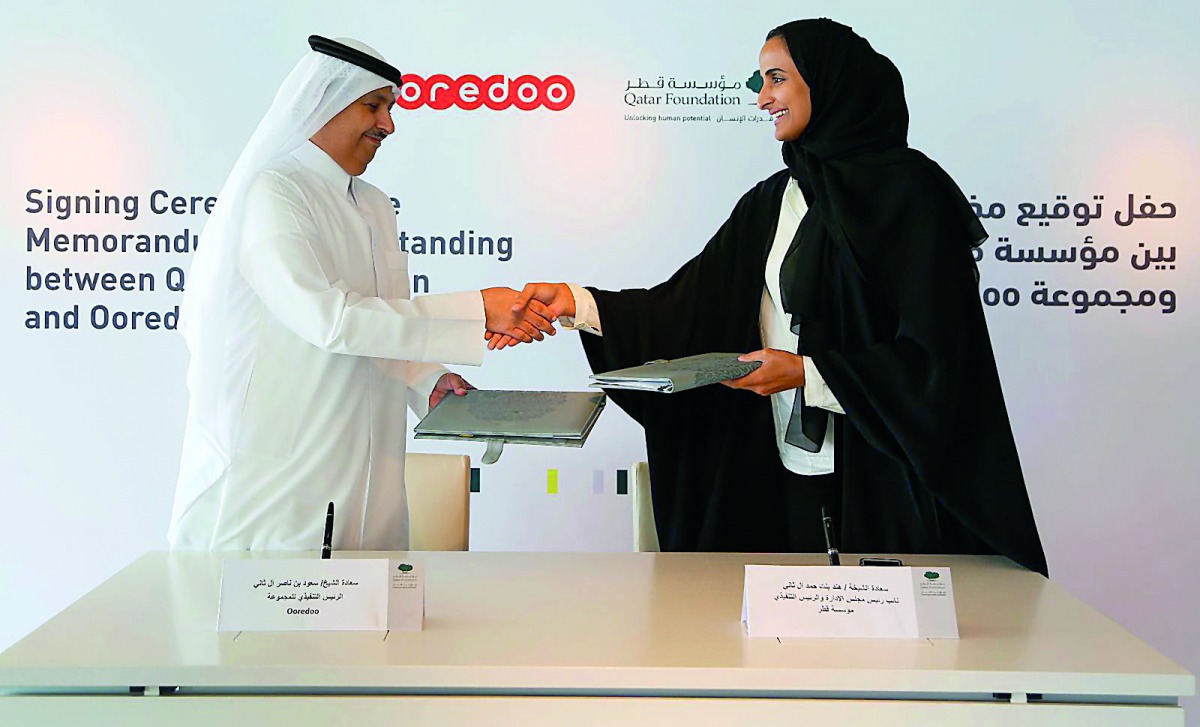 H E Sheikha Hind bint Hamad Al Thani, Vice-Chairperson and CEO of QF, and Sheikh Sauod bin Nasser Al Thani, Group CEO, Ooredoo Group, at the signing ceremony.