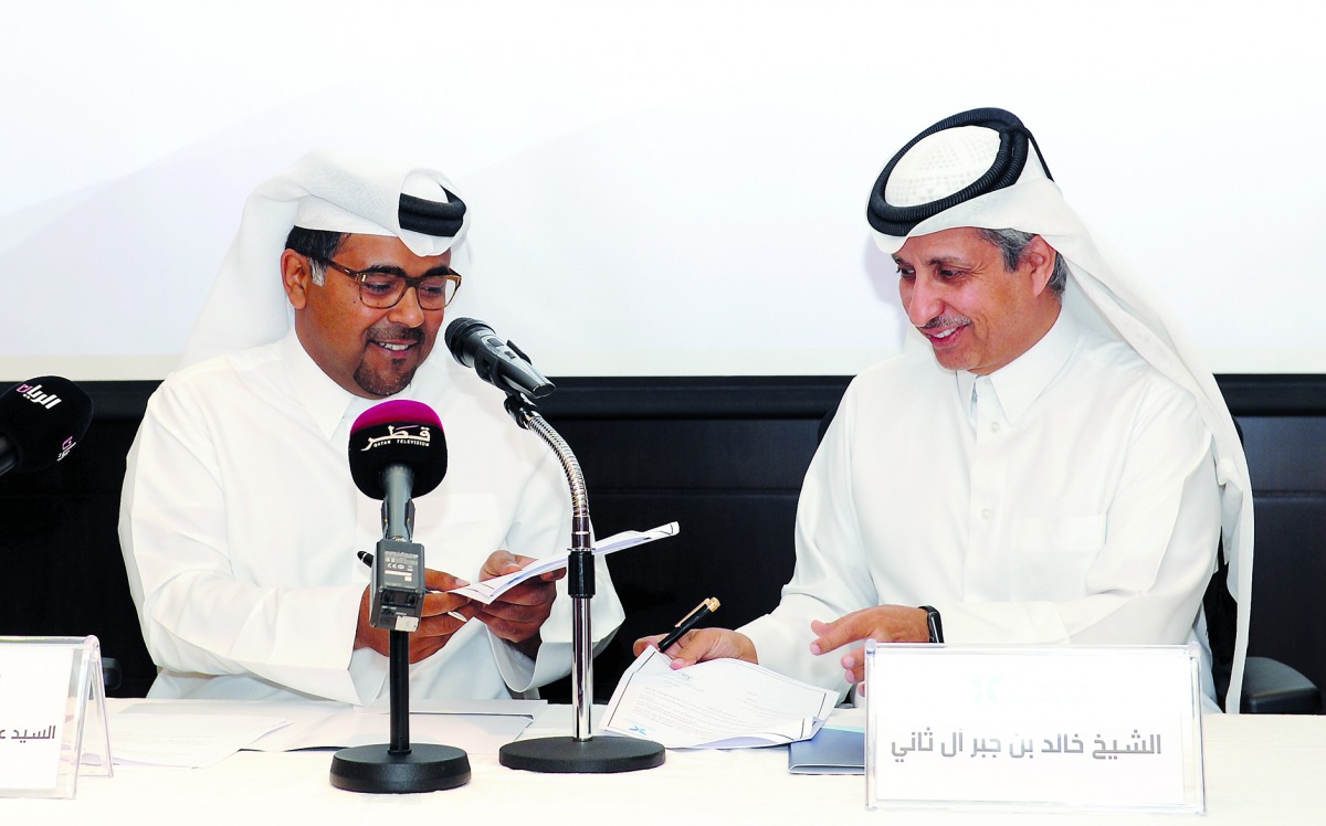 Chairman of Qatar Cancer Society (QCC), Dr Sheikh Khalid bin Jabor Al Thani (right), with Vice-Executive Manager of Social and Sport Contribution Fund, Abdul Rahman bin Abdul Latif Al Mannai, during the agreement signing held at the QCC headquarters in Do