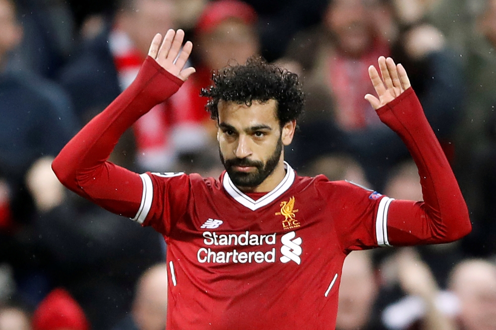 Liverpool's Mohamed Salah celebrates scoring their first goal Action Images via Reuters/Carl Recine