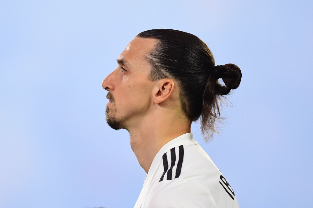 Zlatan Ibrahimovic of LA Galaxy takes in the national anthem before the Major League Soccer match between Atlanta United and LA Galaxy in Carson, California on April 21, 2018. AFP / Frederic J. BROWN