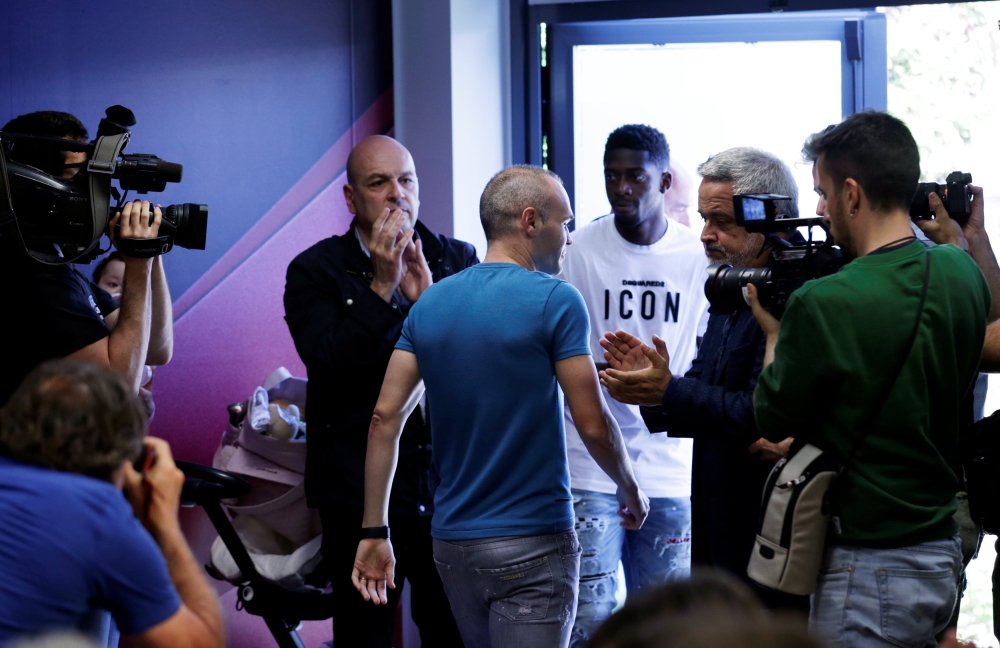 FC Barcelona's Andres Iniesta after the press conference REUTERS/Albert Gea
