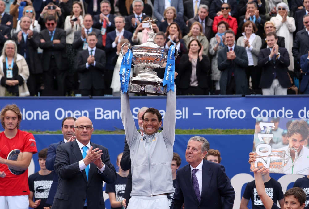 Spain's Rafael Nadal celebrates with the trophy after winning the final against Greece's Stefanos Tsitsipas REUTERS/Albert Gea
