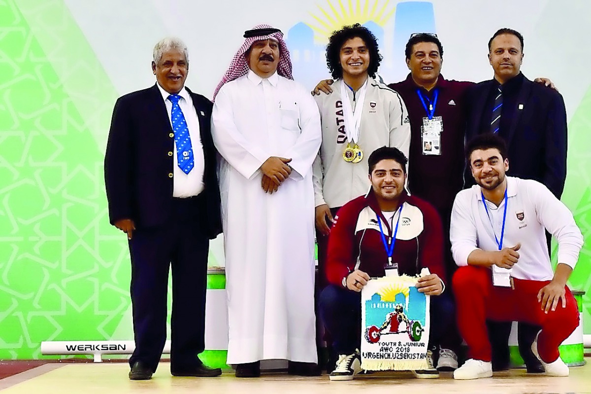 Qatar’s Faris Hassouna poses for a picture after winning three gold medals at the Asian Youth and Junior Weightlifting Championship in Uzbekistan on Sunday.