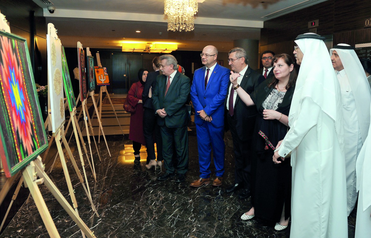Metin Kazak, Ambassador Extraordinary and Plenipotentiary of Bulgaria to Qatar, and Bulgarian artist Petya Ilieva, with guests during the opening of ‘Bulgarian Folk Motifs”. Pic: Salim Matramkot/The Peninsula