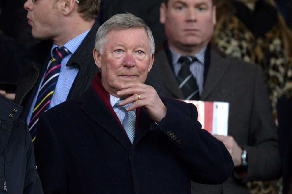 (FILES) In this file photo taken on January 02, 2016 Manchester United's former Scottish manager Alex Ferguson prepares to watch the English Premier League football match between Manchester United and Swansea City at Old Trafford in Manchester, north west