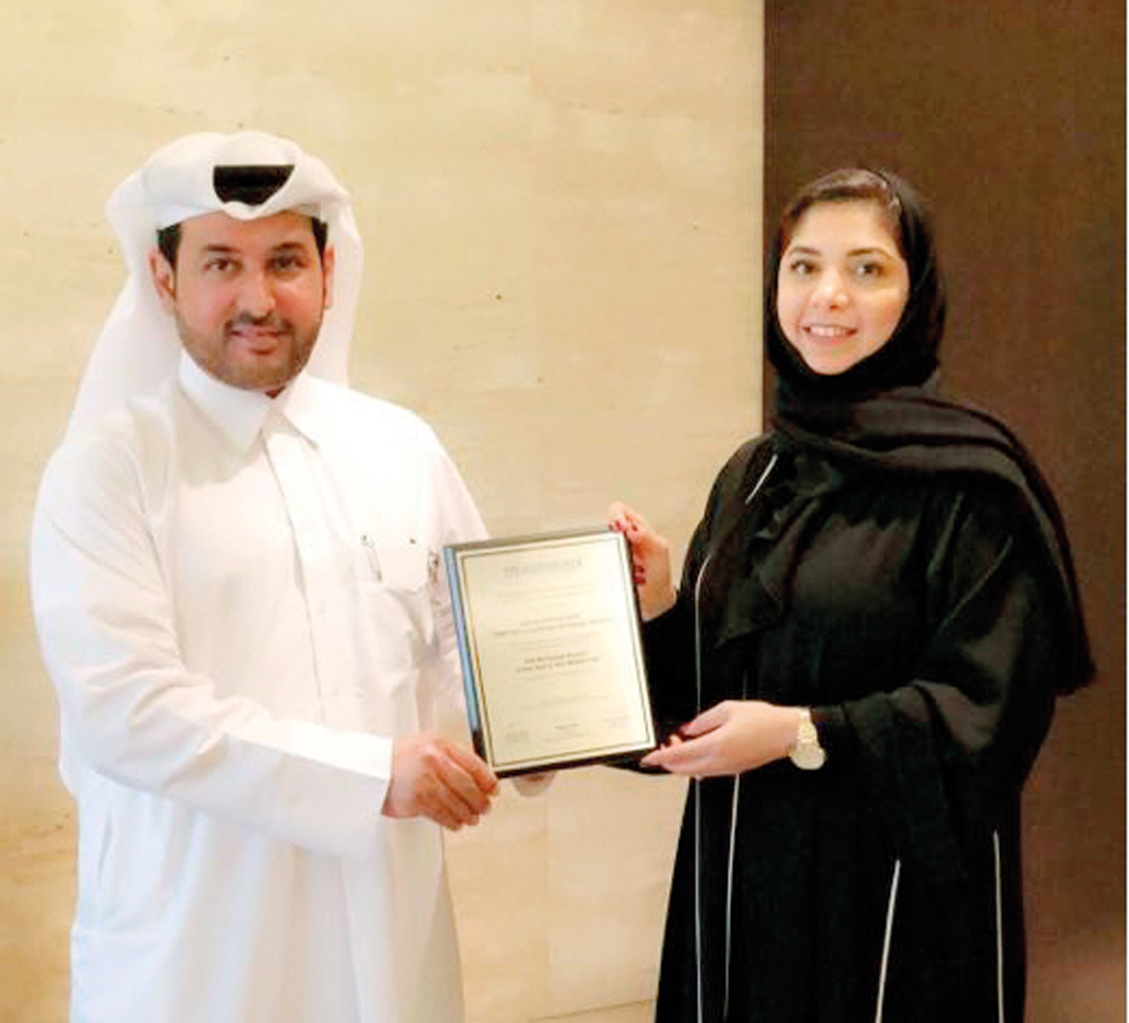 The officials with ‘The Mortgage Product of the Year – QNB First Cross Border Service’ award.