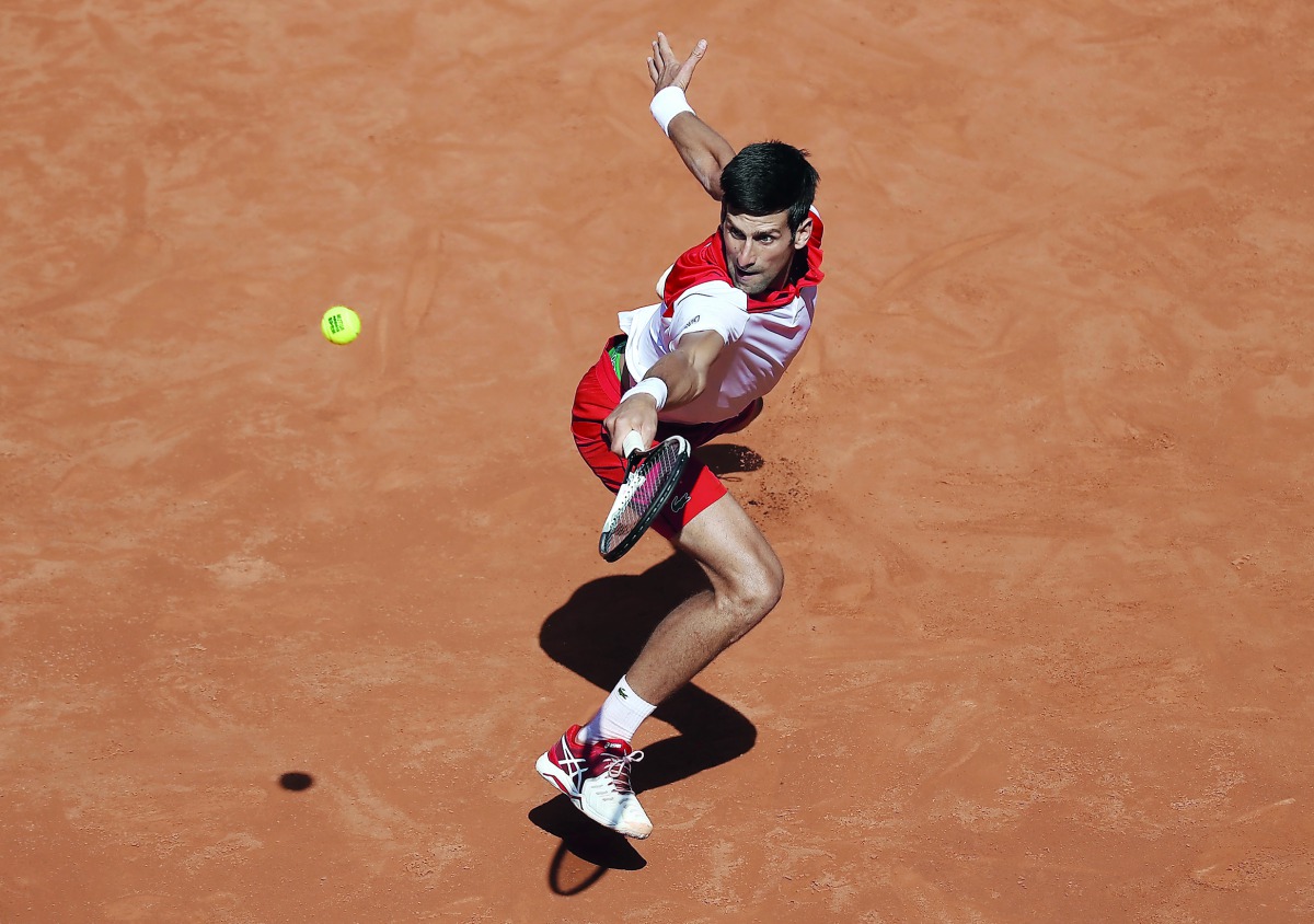 Serbia's Novak Djokovic in action during his first round match against Japan's Kei Nishikori Reuters/Susana Vera