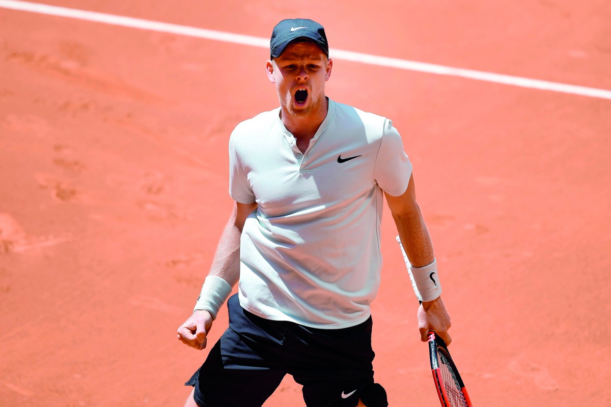 Britain's Kyle Edmund reacts after beating Belgium's David Goffin during their ATP Madrid Open round of 16 tennis match at the Caja Magica in Madrid on May 10, 2018. AFP / Javier Soriano