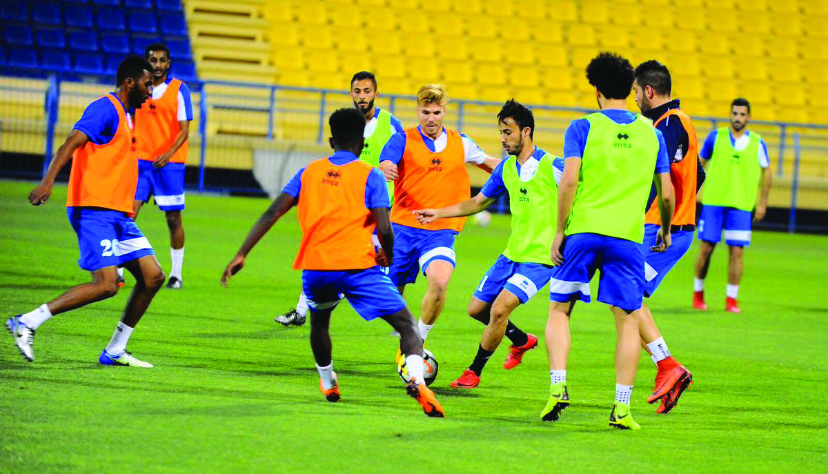 Al Gharafa players in action during a training session ahead of their Amir Cup semi-final against Al Rayyan which will be played at the Al Sadd Stadium today.