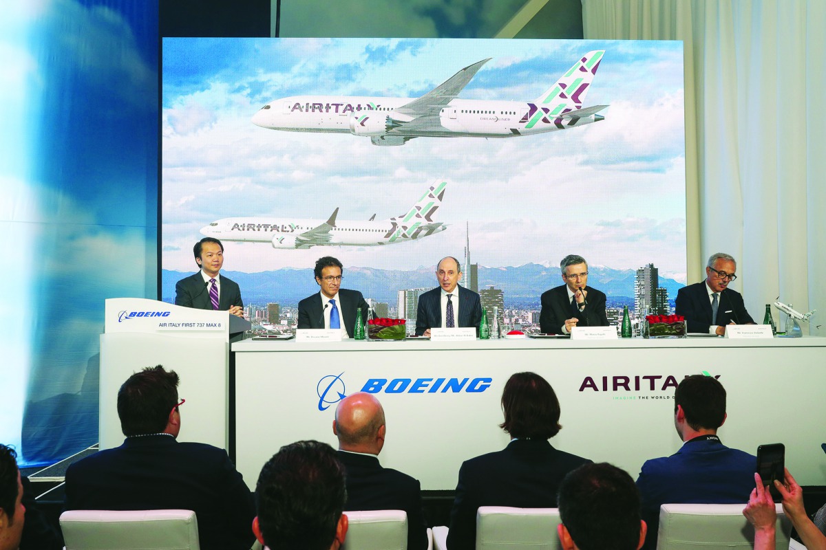 Akbar Al Baker (centre), Group Chief Executive of Qatar Airways, and other officials at a press conference.