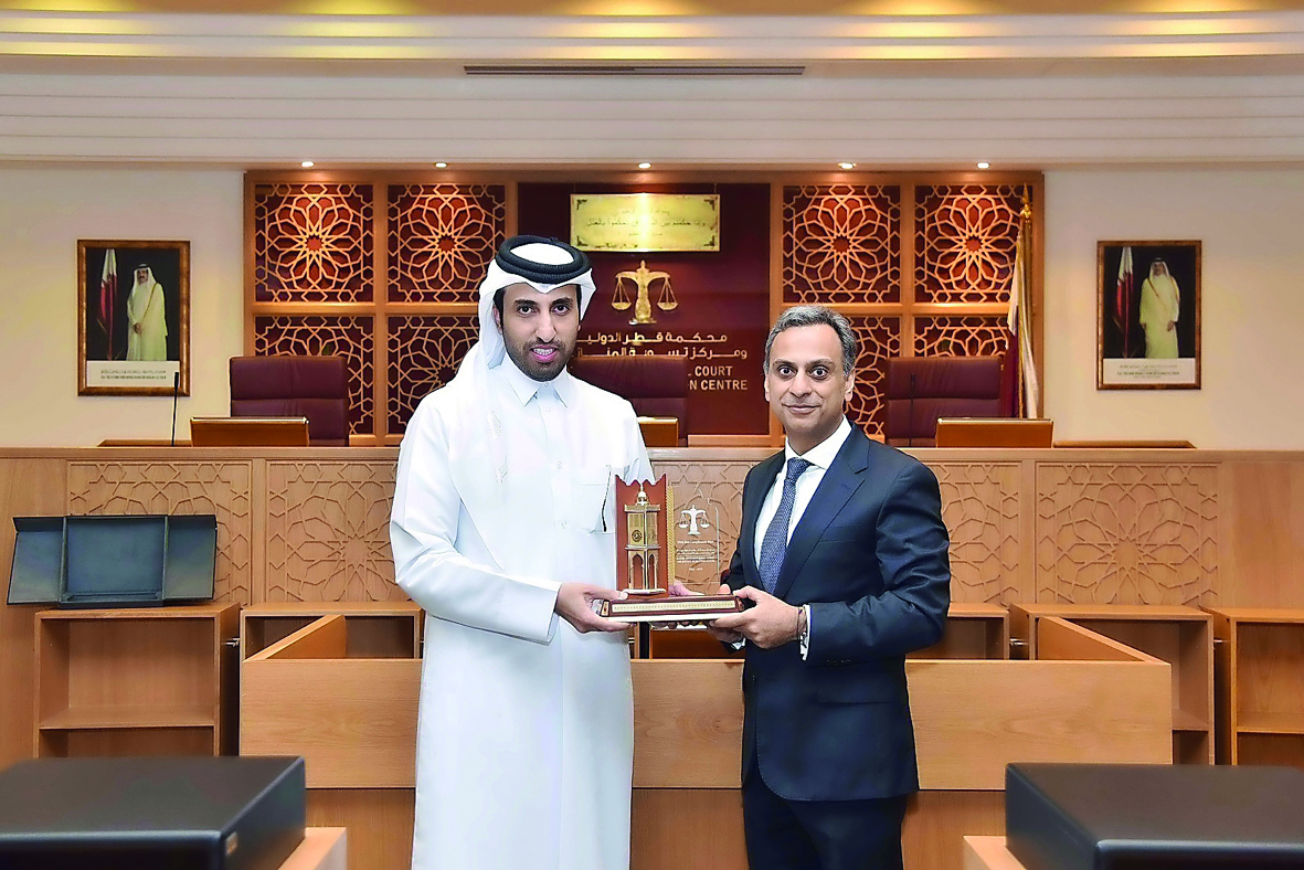 CEO of QICDRC, Faisal bin Rashid Al Sahouti, with  UK Ambassador to the State of Qatar, Ajay Sharma. 