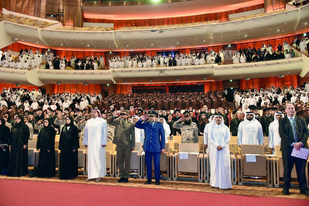 Deputy Prime Minister and Minister of State for Defence Affairs, H E Dr Khalid bin Mohamed Al Attiyah, with other guests during the graduation ceremony. 