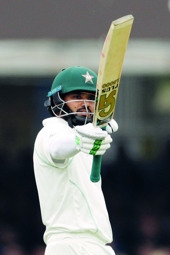 Pakistan's Azhar Ali celebrates reaching a half century Action Images via Reuters/John Sibley
