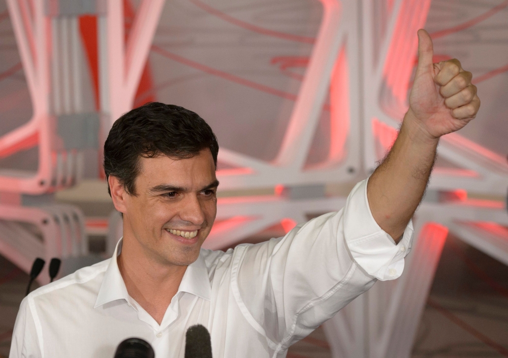 (FILES) In this file photo taken on July 14, 2014 new secretary general of Spain's Socialist Party (PSOE) Pedro Sanchez celebrates his victory at PSOE's headquarters in Madrid. AFP / DANI POZO