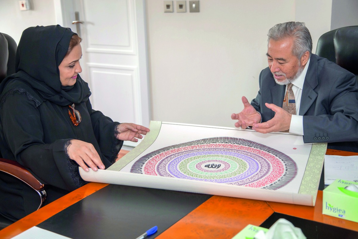 Dr Sheikha Aisha Bint Faleh Al Thani with  Haji Noor Deen Mi Guangjiang.