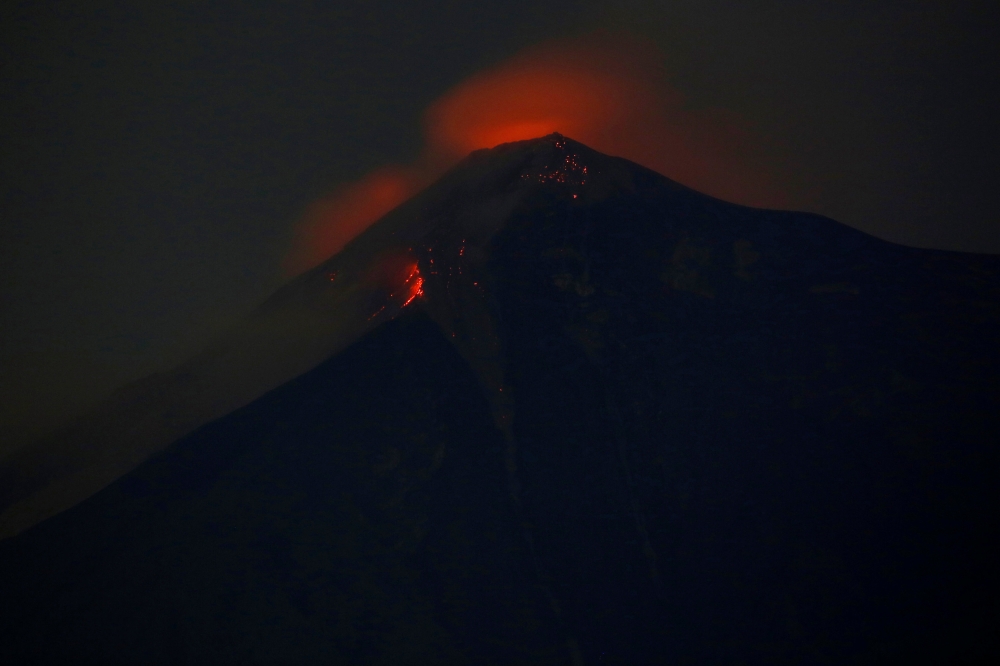 Fuego volcano is pictured after it erupted violently, in San Juan Alotenango, Guatemala June 3, 2018. REUTERS/Luis Echeverria