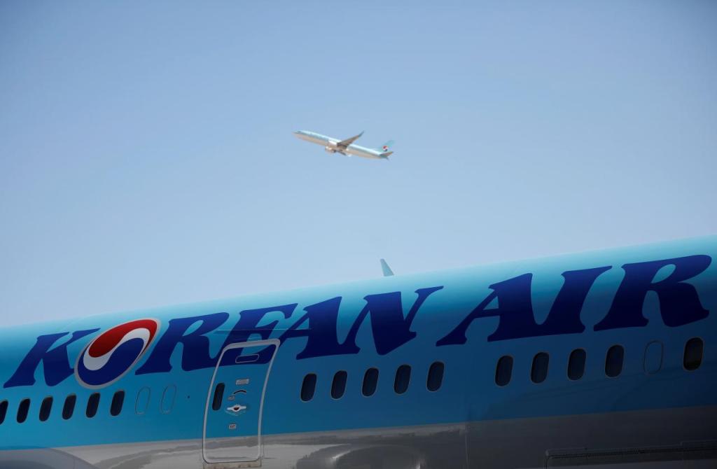 File photo of the logo of Korean Airlines seen on a B787-9 plane at its aviation shed in Incheon, South Korea, February 27, 2017. REUTERS/Kim Hong-Ji/File Photo
