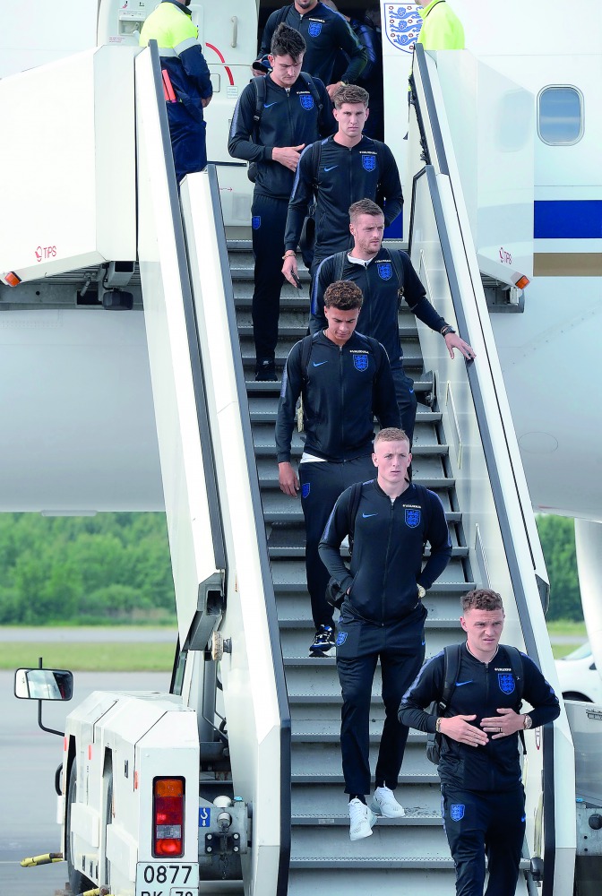 England players arrive at Saint Petersburg's Pulkovo airport on June 12, 2018, to take part in the 2018 FIFA World Cup football tournament in Russia. AFP / Olga Maltseva