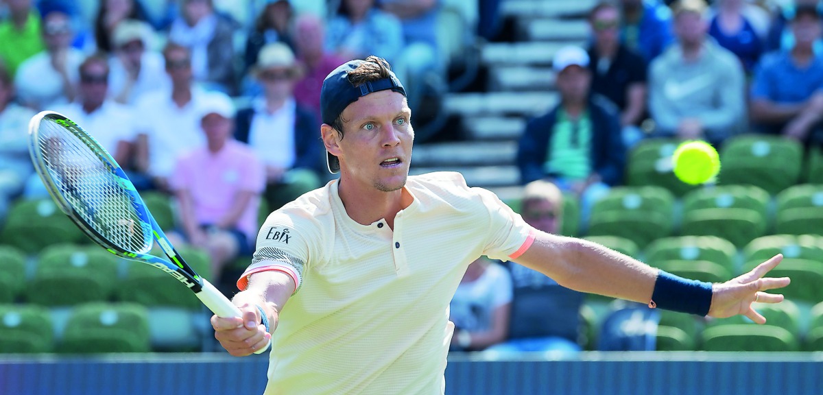 Czech Tomas Berdych returns the ball to French Benoit Paire during their match at the ATP Tour tennis tournament in Stuttgart, southern Germany, on June 14, 2018. AFP / dpa / Marijan Murat