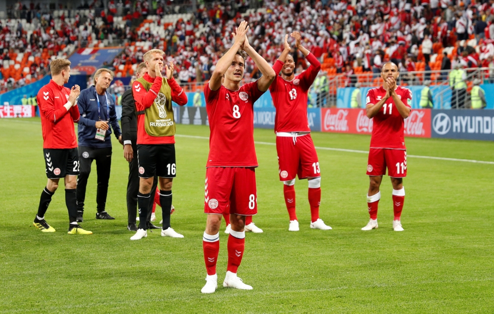  Denmark's Thomas Delaney and team mates applaud the fans at the end of the match (REUTERS/Max Rossi)
