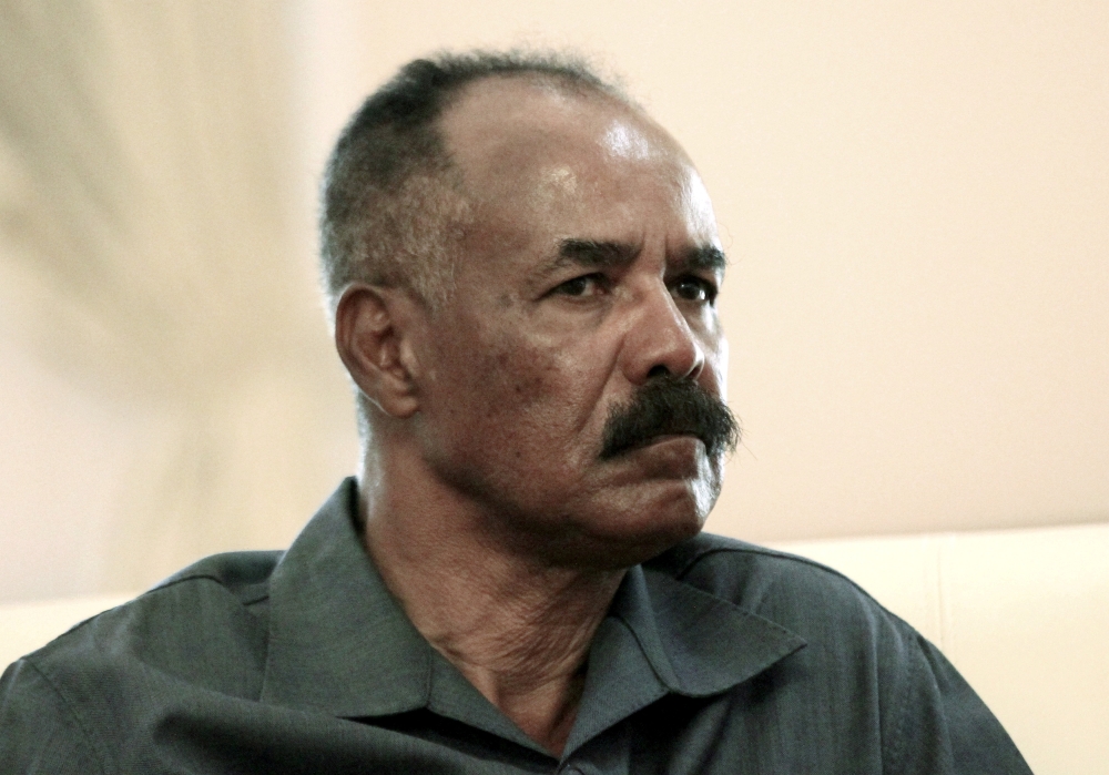 FILE PHOTO: Eritrea's President Isaias Afwerki listens as he meets with Sudan's President Omar al-Bashir during his official visit in Khartoum, Sudan June 11, 2015. REUTERS/Mohamed Nureldin Abdallah/File Photo
