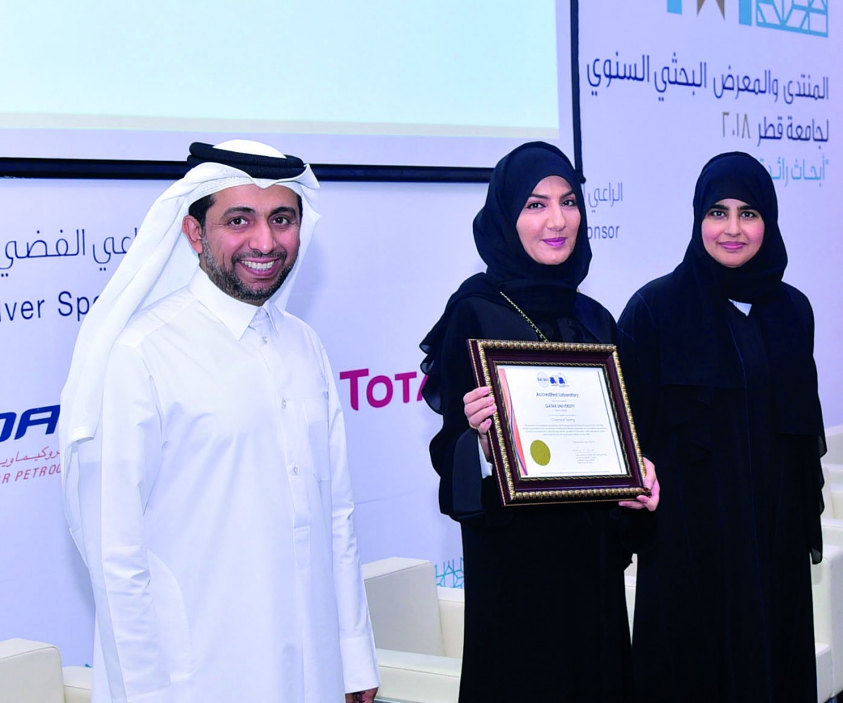 Dr Hassan Al Derham (left), President of Qatar University, with other officials.