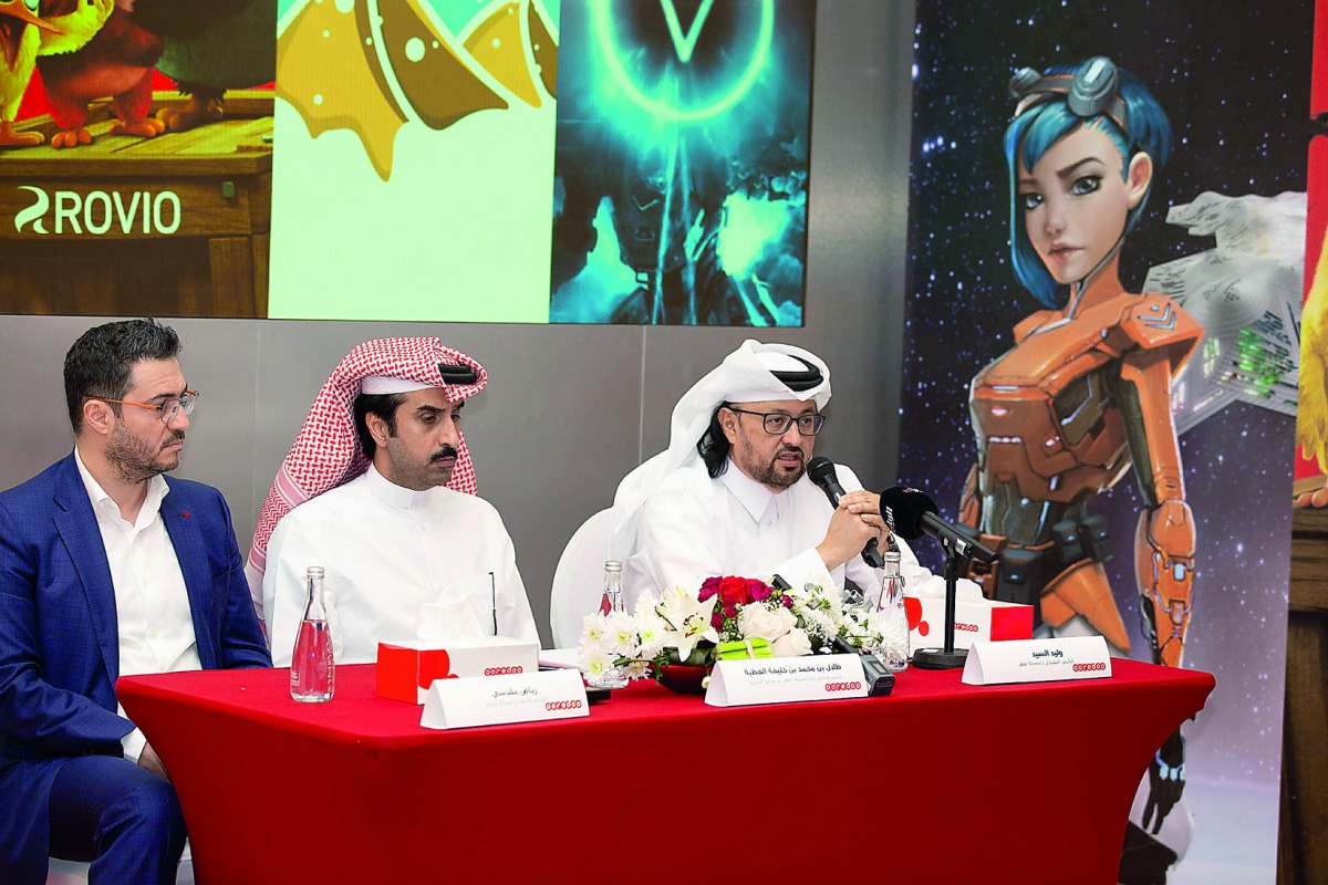 Waleed Al Sayed (right), Chief Executive Officer of Ooredoo Qatar, speaking after the signing event.