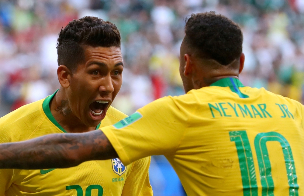 Brazil's Roberto Firmino celebrates scoring their second goal with Neymar. (REUTERS/Michael Dalder/File Photo)