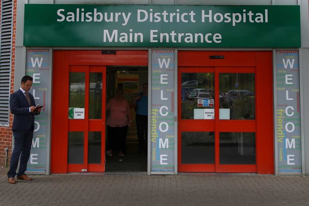 A general view shows the main entrance to Salisbury District Hospital in Salisbury, southern England, on July 4, 2018 where a man and a woman are in critical condition after exposure to an unknown substance and being found unconscious at a house in Amesbu