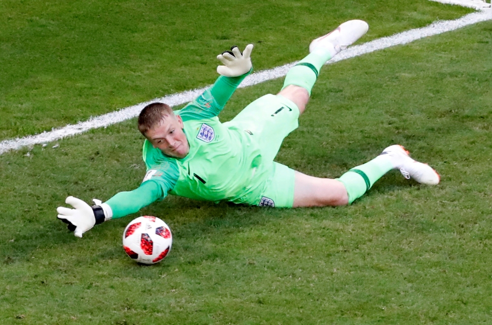 England's Jordan Pickford making a save. (REUTERS/David Gray)