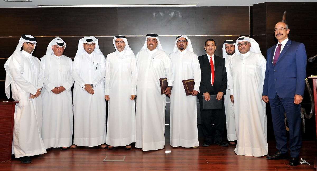 Minister of Culture and Sports H E Salah bin Ghanem Al Ali (fourth left), with Jassim Tawar Al Kuwari (fifth left), Chairman, Tawar Mall; Essa Abdulrahman Al Kuwari (fifth right) of Broadcasting Licenses Department at the Ministry of Culture and Sports; a