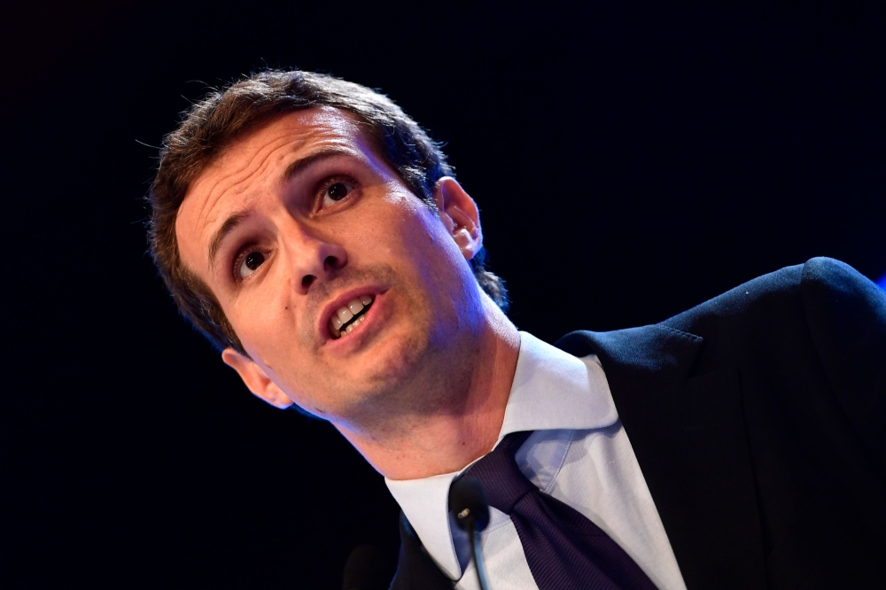 Spanish lawmaker Pablo Casado delivers a speech after being chosen as the next leader of Spain's Popular Party (PP) at the end of a party meeting in Madrid on July 21, 2018.  AFP / Pierre-Philippe Marcou
