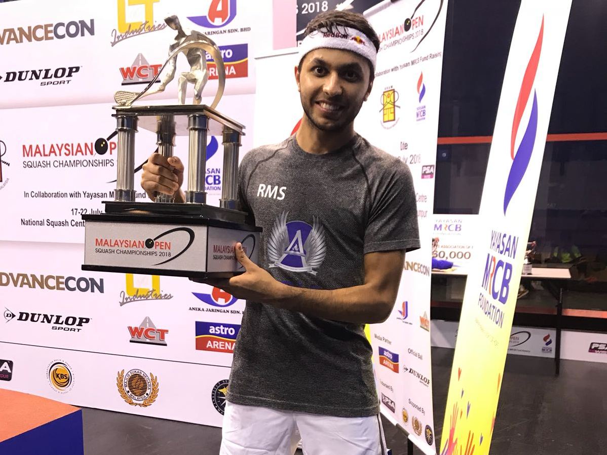 Abdullah Al Tamimi  with the trophy (Pic: Qatar Olympic Committee)