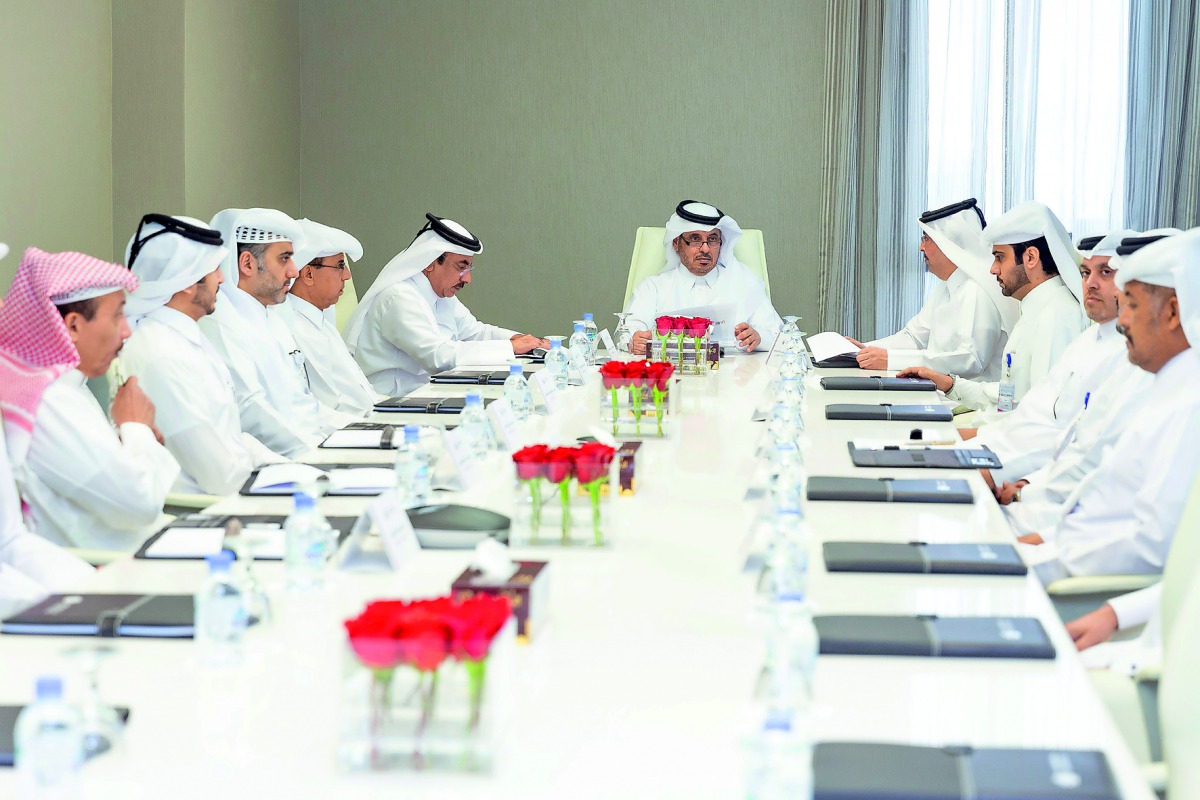 Prime Minister and Interior Minister H E Sheikh Abdullah bin Nasser bin Khalifa Al Thani holding discussions during his visit to Qatar Civil Aviation Authority yesterday.