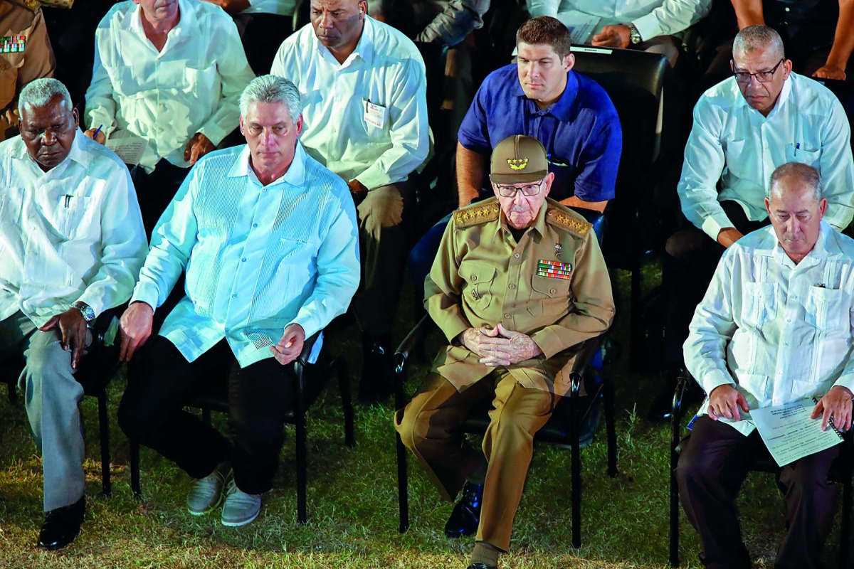 Cuban former President and first secretary of the Cuban Communist Party, Raul Castro (2-R) and Cuban President Miguel Diaz-Canel (2-L) attend the celebrations of the Moncada Barracks assault's 65th anniversary, in Santiago de Cuba, eastern Cuba, on July 2