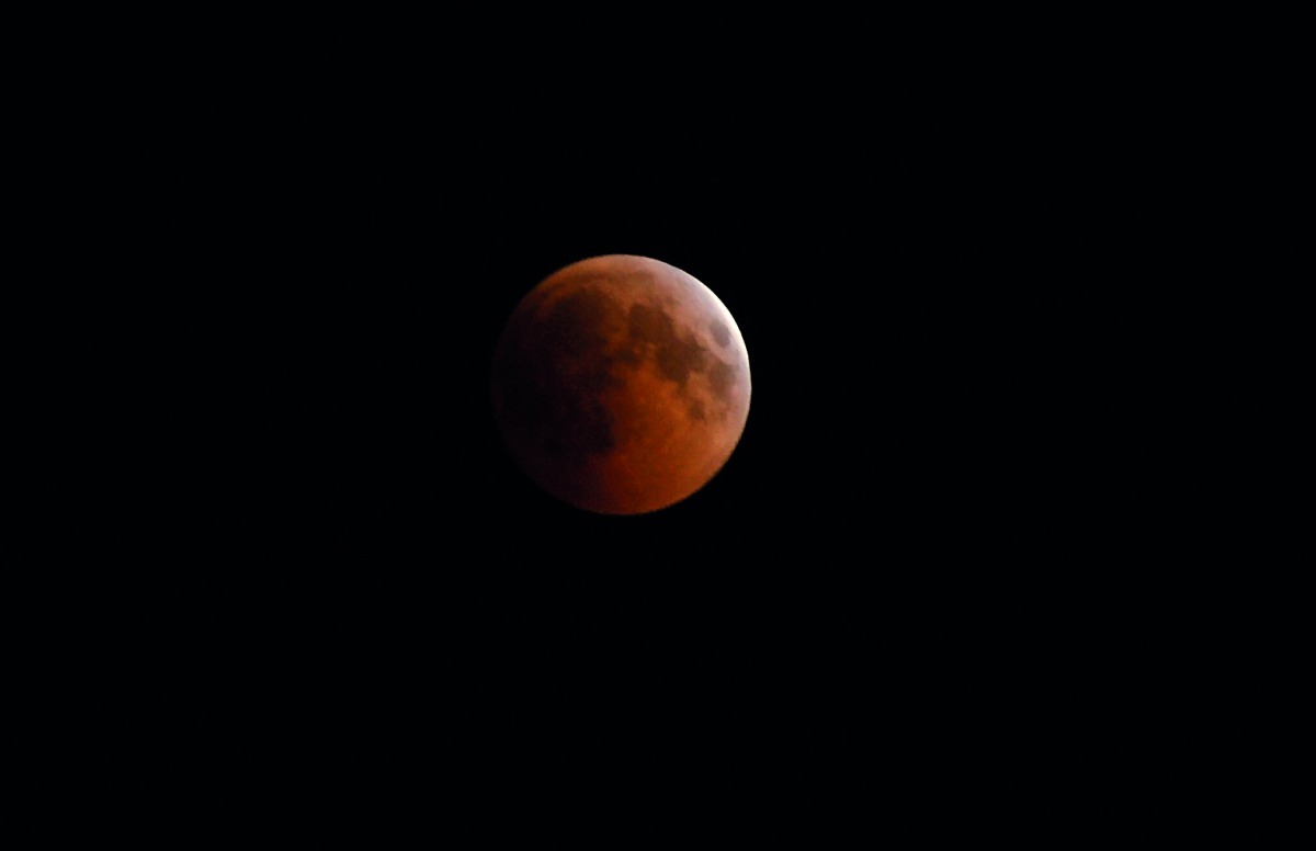 A view of the longest total lunar eclipse of the century captured from the Doha Corniche last night.  Pic:Salim Matramkot/The Peninsula. 