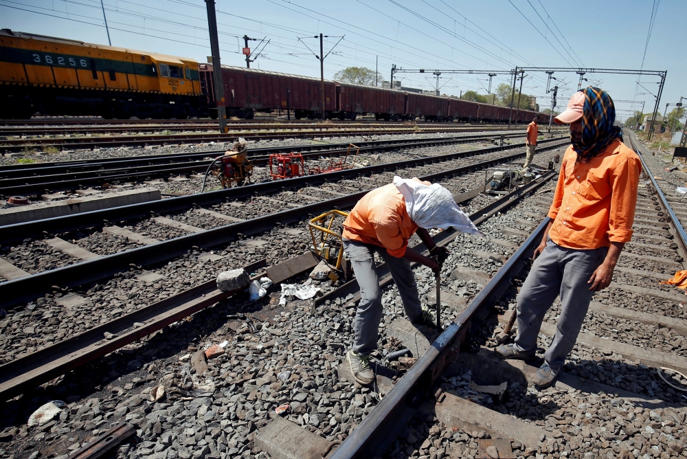 This March 24, 2017 picture of a worker fixing a railway track in Ahmedabad, India, used here for representaion. Reuters/Amit Dave

